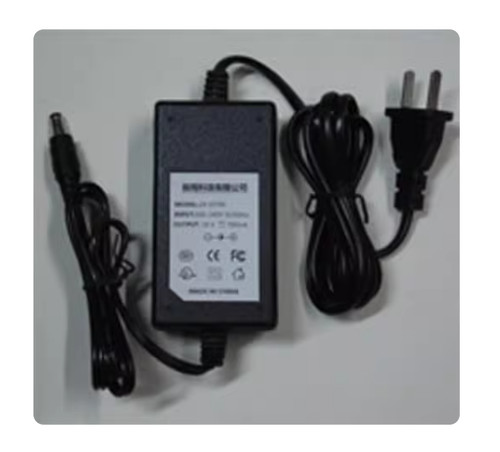 Power supply adapter well - adapter,
